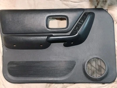 Panel de puerta delantero del conductor OEM Jeep Cherokee XJ 97-01 negro sobre gris niebla    Foto 1 de 4