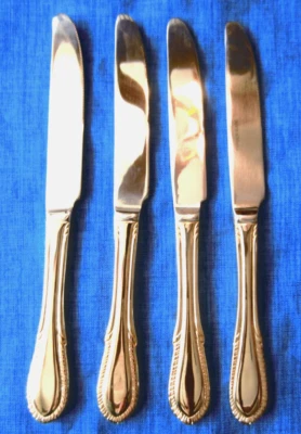 Cuchillo de cena 4 Farberware acero inoxidable chapado en oro brisa mango liso Foto 1 de 4