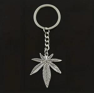 Llavero Hoja Hierba Cannabis Llavero Metal Plateado Música Vibe Llaves Marihuana Humo - Imagen 1 de 3