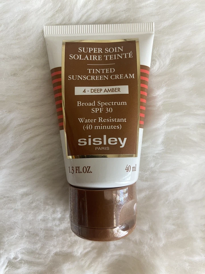 Crema protectora solar tintada Sisley Paris FPS 30 tonos 3 ámbar profundo. 1,3 oz SELLADO Foto 1 de 1