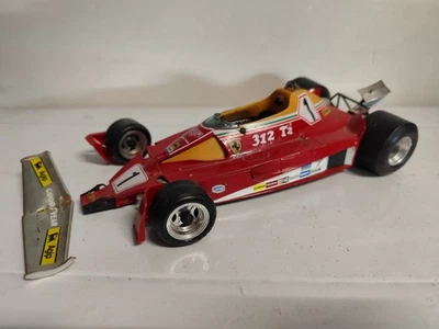 Burago Formula 1 Ferrari 312 T2 Scala 1:14 Italy Danneggiata Pezzi Mancanti - Immagine 1 di 4