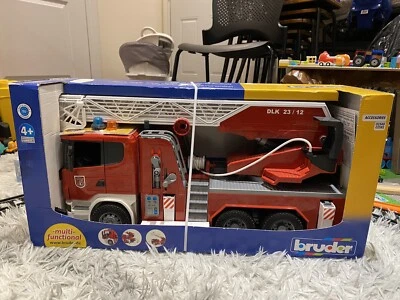 Bruder 1/16 Scania R-Serie Fire Engine with Water Pump and L and S Module 03590 - Image 1 of 4