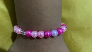 Children’s pink and purple pearl bracelet - Picture 1 of 1