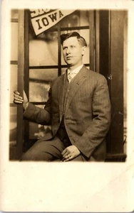 Vintage RPPC Postcard Studio Photo of a Man with IOWA Pennant in background IA - Picture 1 of 4