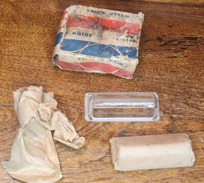 Pair NOS NISSAN DATSUN BLUEBIRD 410 411  License Plate Light Lenses 26511-10600 - Image 1 of 4