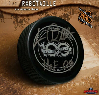 Disco de juego oficial autografiado por LUC ROBITAILLE NHL100 - Los Angeles Kings HOF09 Foto 1 de 2