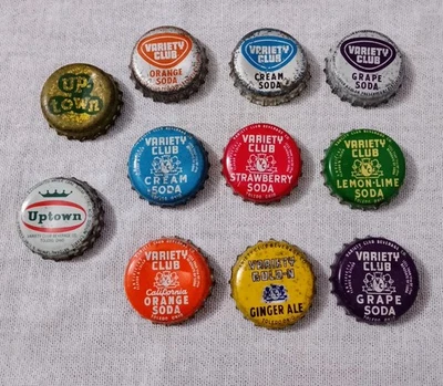 LOTE 11 TAPAS DE BOTELLAS DE SODA CORCHO UVA CLUB VARIEDAD UVA NARANJA FRESA UPTOWN TOLEDO Foto 1 de 2