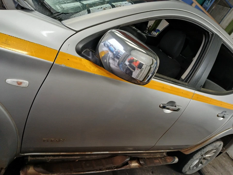 MITSUBISHI L200 FRONT DOOR IN SILVER N/S/F LEFT PASSENGER 2015-2019 ~ - Image 1 of 4