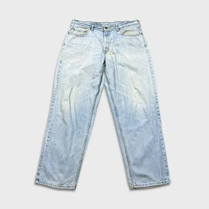 Pantalones de mezclilla vintage años 90 Levi's 535 para hombre 38x32 azul ajuste euro lavado claro pierna ancha holgados - Imagen 1 de 12