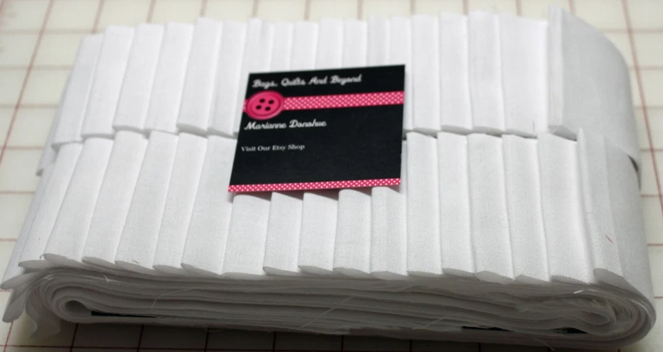 jelly roll  White Solid  Forty 2.5 inch strips - Image 1 of 1