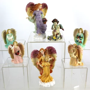 Lot of 7 resin Angel figures Picks compare to a quarter. Get all seven statues - Picture 1 of 18