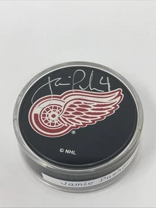 Jamie Pushor signiert Detroit Red Wings Ravens Athletic Puck signiert in Silber - Bild 1 von 5