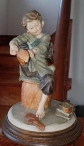 Giuseppe Armani Sculpture (Frustrated Boy Putting on Socks.) - Picture 1 of 9