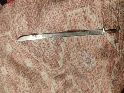 Espada cabeza perro mexicano Foto 1 de 3