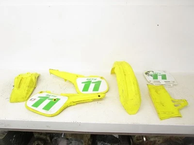 03 Kawasaki KX 60 RM 60 plástico guardabarros delantero trasero cubiertas laterales amarillo 2003 Foto 1 de 4