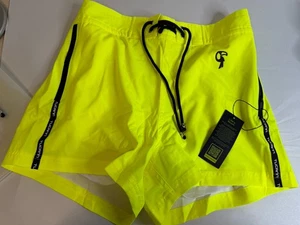 Bañador Tucann para hombre S pequeño amarillo con forro blanco bolsillos con cremallera 3" - Imagen 1 de 6