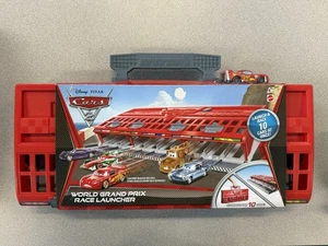 2010 Disney Pixar CARS 2 World Grand Prix Race Launcher Storage Case & McQueen - Picture 1 of 6