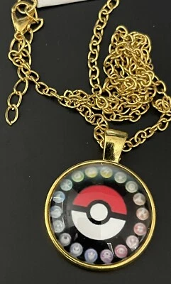 Pokemon Mega Stone Fire Pokeball Gold Toned Necklace and Pendant Set NEW - Image 1 of 4