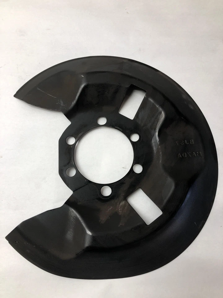 MAZDA 3 2016 placa de freno trasera izquierda del lado del conductor protección contra el polvo cubierta protector T Foto 1 de 4