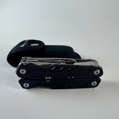 Alicates plegables multiherramienta Ozark Trail negros de acero inoxidable con funda EDC camping Foto 1 de 4