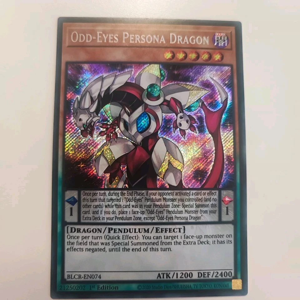 YuGiOh Odd-Eyes Persona Dragon BLCR-EN074 Secret Rare Neu 1st NM..  - Bild 1 von 1