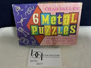 Chad Valley 6 Rompecabezas de Metal - De Colección Años 60 - Prueba de Habilidad - Caja Original Instrucciones - Imagen 1 de 8