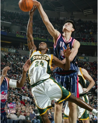 Yao Ming Houston Rockets Unsigned Blocking Desmond Mason Photograph Cover