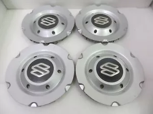 SUZUKI VITARA 2001-2003 SILVER CENTER CAPS - SET OF 4 - 72675 - OEM - Picture 1 of 7