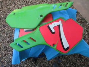 1988 kawasaki kx500 side number plates (OEM) and front number plate - Picture 1 of 8