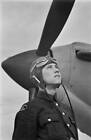 Air Training Corps cadet stands wearing a flying outfit front a- 1941 Old Photo