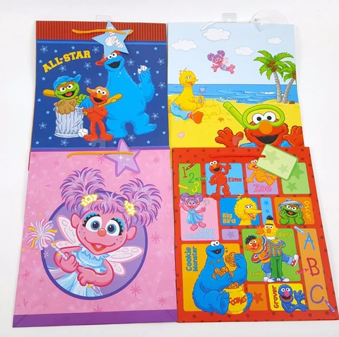 4 PACK LOT SESAME STREET GIFT BAGS MEDIUM SIZE BIRTHDAY ELMO COOKIE MONSTER ABBY Cover