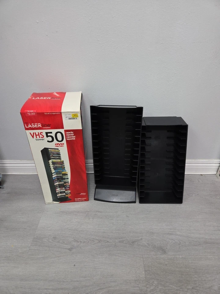 Torre de almacenamiento de cinta VHS de 50 ranuras Laserline estante de plástico negro estante multimedia (nuevo en caja) Foto 1 de 4