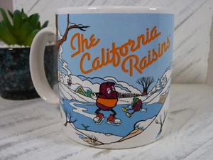 1988 The California Raisins Coffee Mug Ice-Skating/Sledding Winter Scene - M1 - Picture 1 of 10
