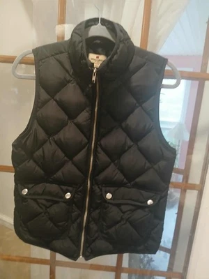 CHAQUETA ACOLCHADA NEGRA DE PLUMÓN DE PATO WOOLRICH DE COLECCIÓN CHALECO INFANTIL PEQUEÑO Foto 1 de 3