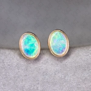 Minimalist Oval Australian Solid Opal Stud Earrings 14k Yellow Gold - Picture 1 of 5