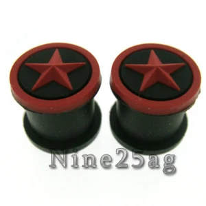 PAR DE TAPONES DE SILICONA DE 24 MM ESTRELLA NEGRA/ROJA 15/16 PULGADAS - Imagen 1 de 2