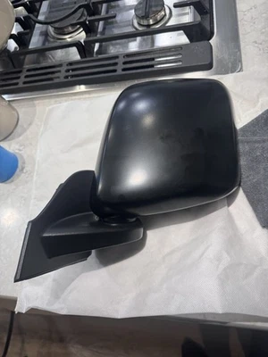 Espejo retrovisor lateral del conductor Nissan NV200 2013-2021 - manual sin alimentación Foto 1 de 4