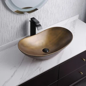 Lavabo lavabo de cerámica dorado de lujo con forma de barco para tocador de baño - Imagen 1 de 4