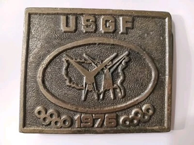 Anillos olímpicos 1976 de colección USGF Federación de Gimnasia de los Estados Unidos Hebilla de cinturón de latón Foto 1 de 4