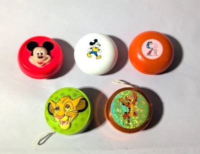 LOTE 5 DE COLECCIÓN DISNEY MICKEY MOUSE DONALD DUCK TIGGER SIMBA PEANUTS SNOOPY YO-YO Foto 1 de 4