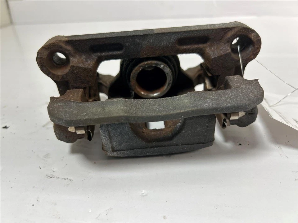 Pinza de freno trasera Nissan Frontier 2005-2023 pasajero 41 k millas OEM Foto 1 de 4