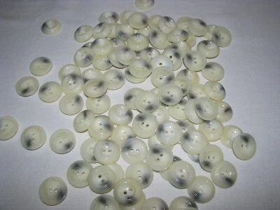 Bag of 100 One Inch Ivory Grooved & Gray Spot Two Hole Buttons - Image 1 of 3