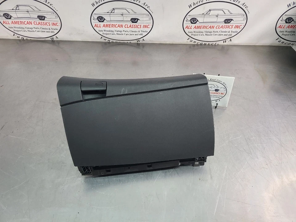 Pontiac G8 2009 conjunto de guantera de tablero delantero lateral para pasajeros, negro - OEM Foto 1 de 4