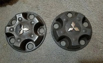 Tapacubos de rueda de aleación central Mitsubishi RAIDER 06 07 08 OEM Negro - 2 tapas Foto 1 de 4