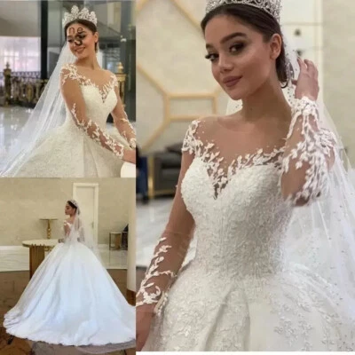 Vestidos de novia vintage de encaje con apliques de cuello transparente y lentejuelas Foto 1 de 4
