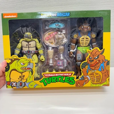 Paquete de 2 dibujos animados NECA TMNT Teenage Mutant Ninja Turtles Tokka y Rahzar TOTALMENTE NUEVO Foto 1 de 4