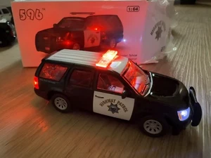 Customized 596 Brand 1/64 Chevrolet Tahoe - California Highway Patrol (CHP) LED - Picture 1 of 2