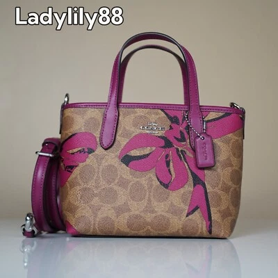 NWT Coach CY736 City Mini Tote Bag In Signature Canvas With Bow Print $250 - Image 1 of 4