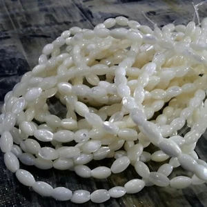 Cáscara de troco natural, arroz, blanco cremoso 7x4-5 mm, aprox 54 piezas, envío gratuito - Imagen 1 de 3