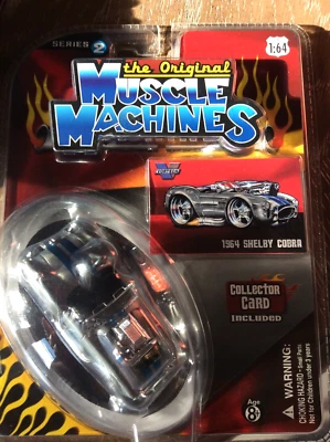 The Original Muscle Machines  1/64 1964 SHELBY COBRA - Gray with Blue Stripes  - Image 1 of 4